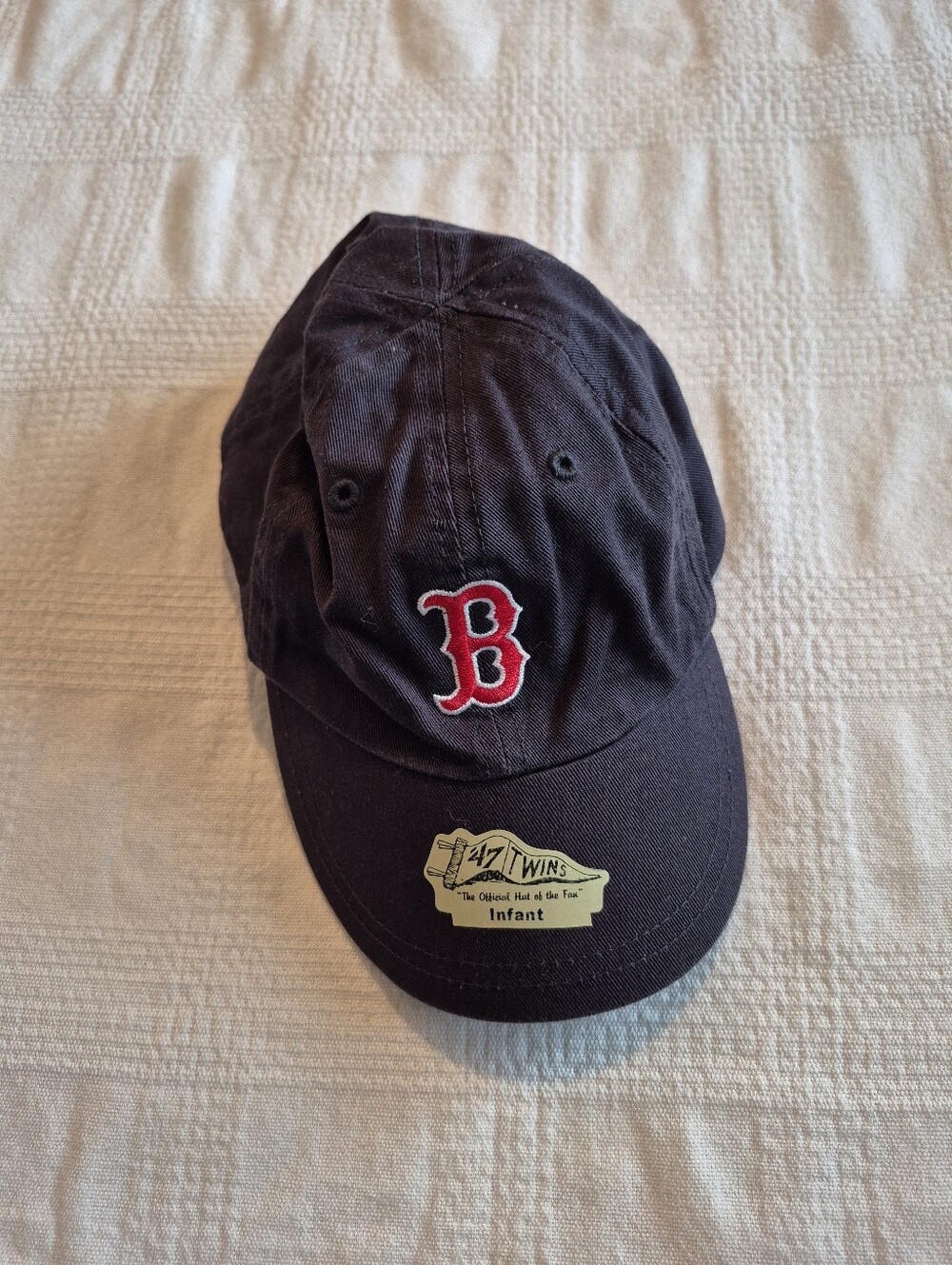 Genuine Merchandise Infant baseball cap, blue elastic back 18" on inside NEW